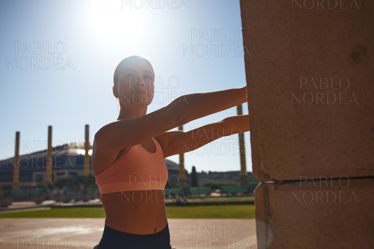 Portrait of fit and confident woman exercising stock photo