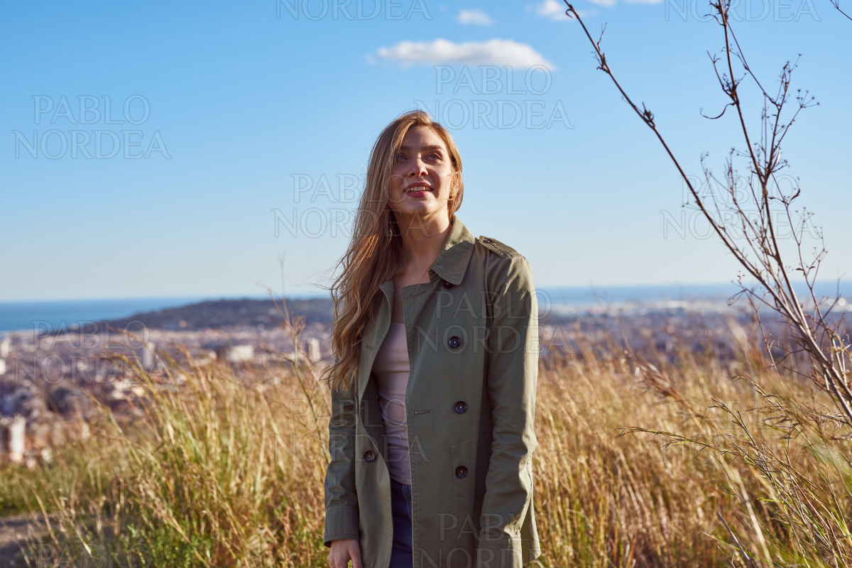 Relaxed lady looking into the distance stock photo