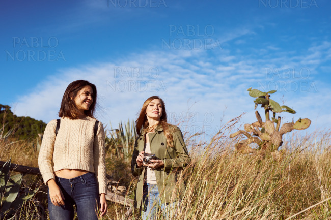 Female friends together on mountain trip