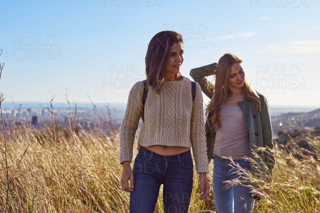 Two happy ladies in a field