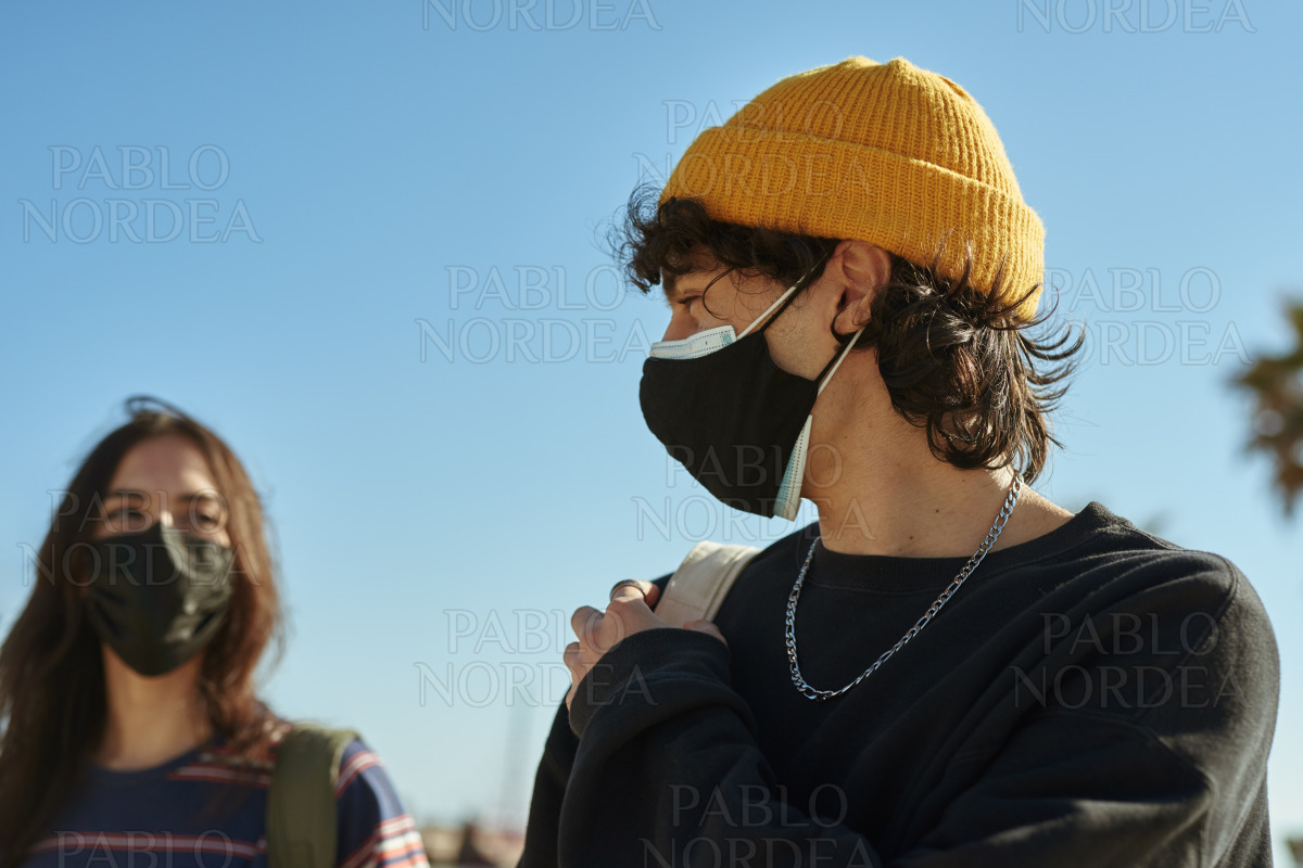 Two contented young people taking a walk stock photo