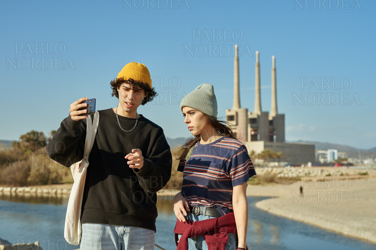 Two drawn young people talking a selfie stock photo