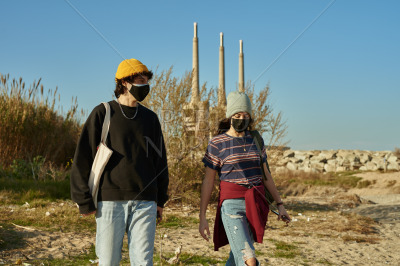 Attractive young couple walking together outdoors