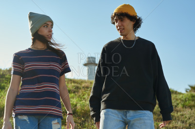 Two carefree young people taking a walk