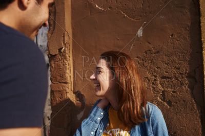 Young woman laughing as she turns her head