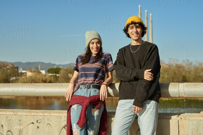 Cute young couple smiling at camera
