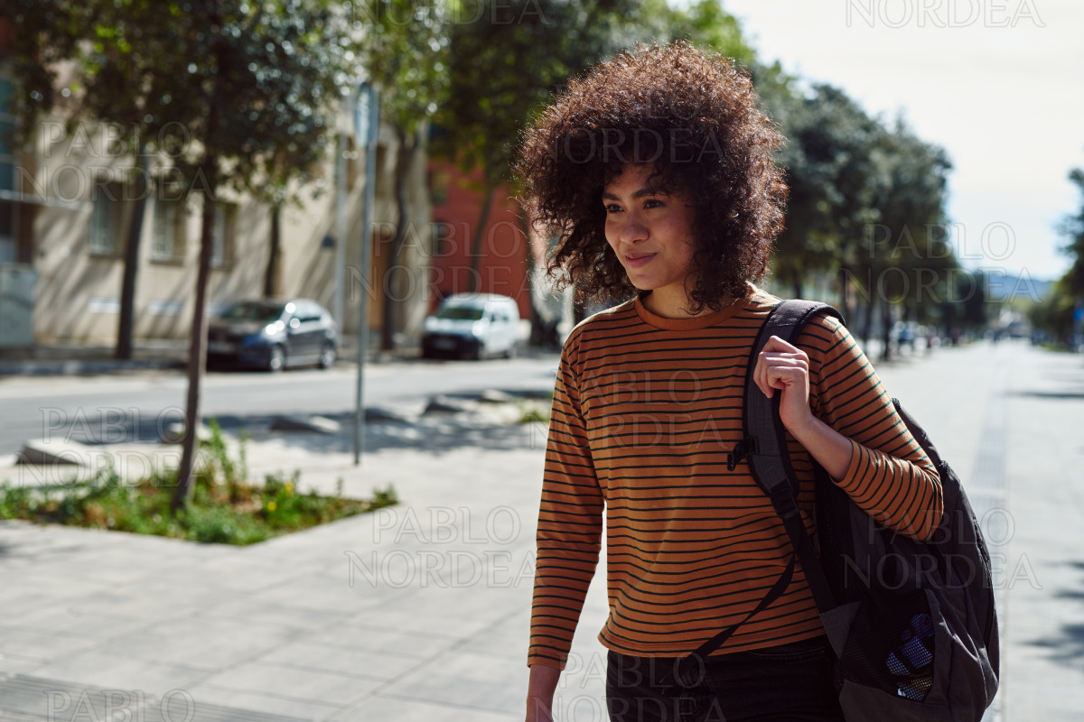 Attractive girl taking a walk outdoors stock photo