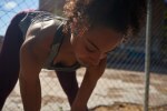 Young black woman working out outdoors