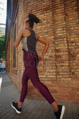 Fit young woman jogging in the city
