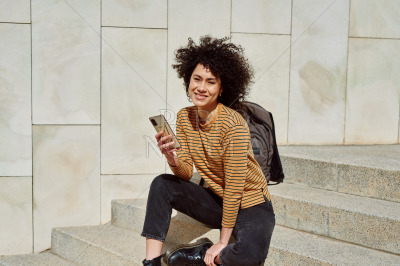 Smiling black girl looking at camera