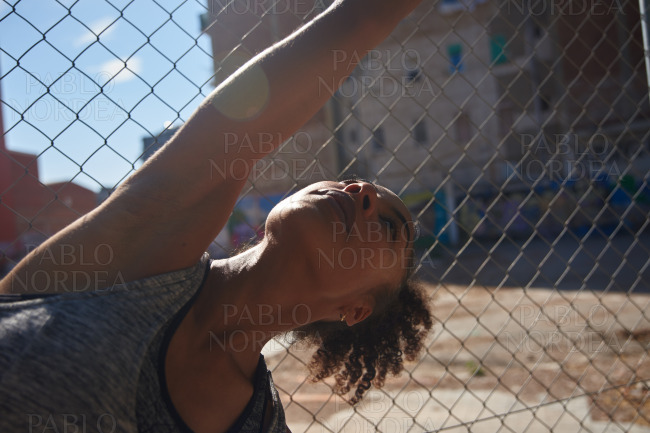 Attractive young black woman exercising outdoors