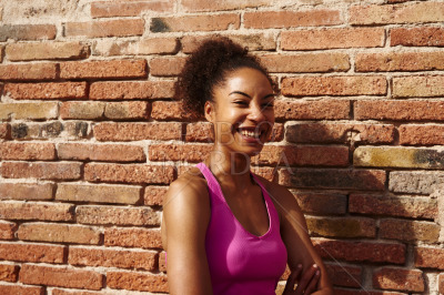 Athletic young woman smiling at the camera