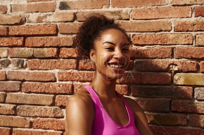 Fit young woman smiling at the camera