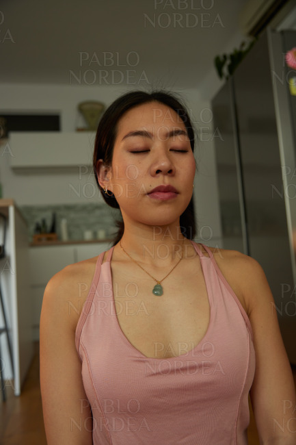Young woman relaxing during practicing yoga