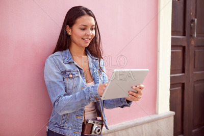 Cute young girl with a tablet pc
