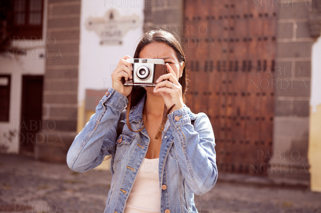 Girl focusing on taking a picture