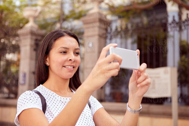 Picture taking girl with cell phone
