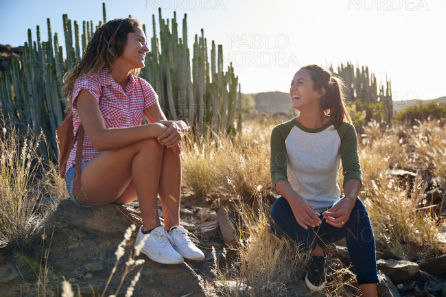 Two hiking girls taking a rest